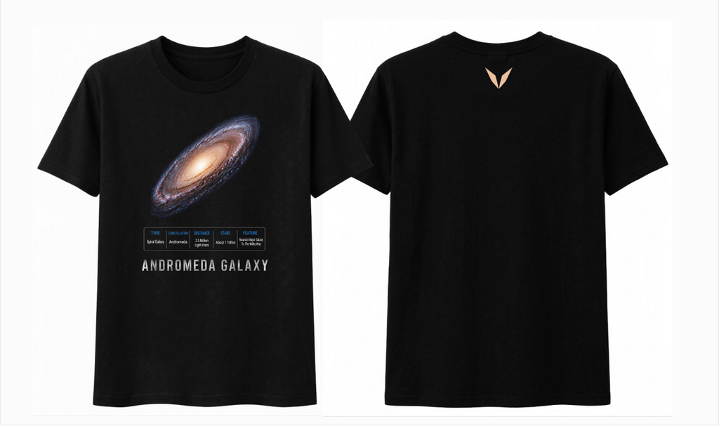Front and back preview of Voltare Andromeda Galaxy black tee with spiral galaxy artwork, galaxy-facts panel and soft peach Voltare V logo