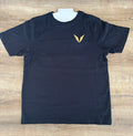 Actual black Voltare crew-neck tee sample laid flat, showing gold V embroidery on the left chest.