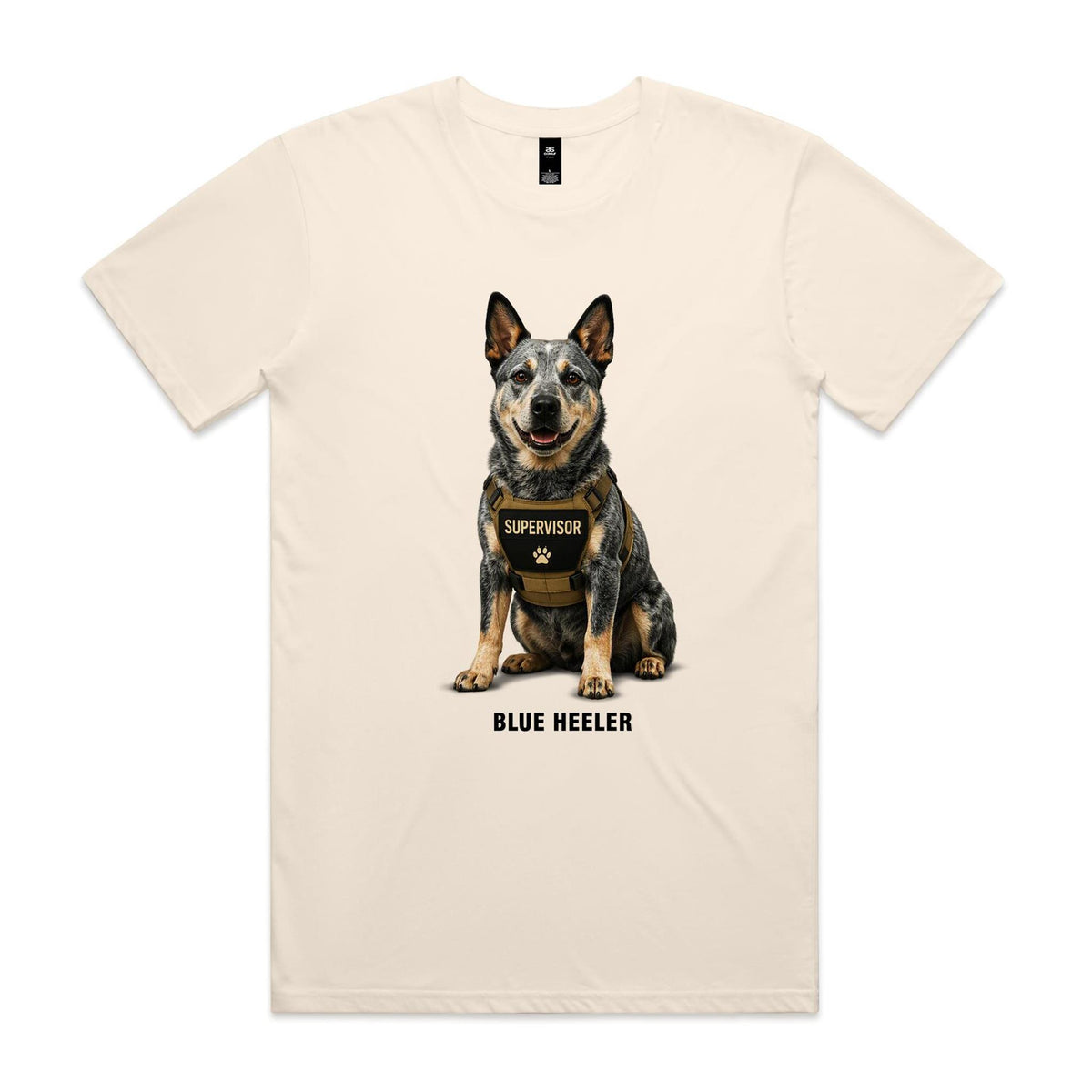 Ecru Voltare adult tee featuring a blue-grey speckled Blue Heeler wearing a tan harness with a Supervisor badge, paw-print detail and black Blue Heeler lettering.