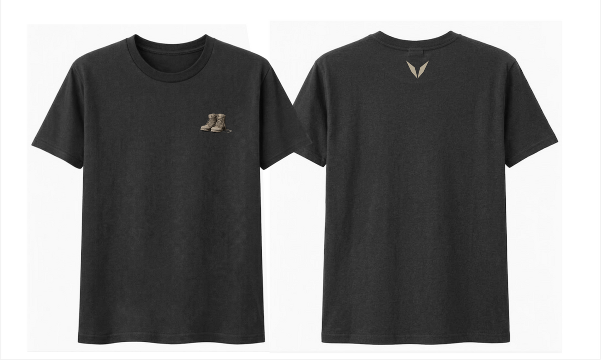Front and back of the Black Voltare Boots on the Ground tee with combat-style boots chest artwork and a taupe back V
