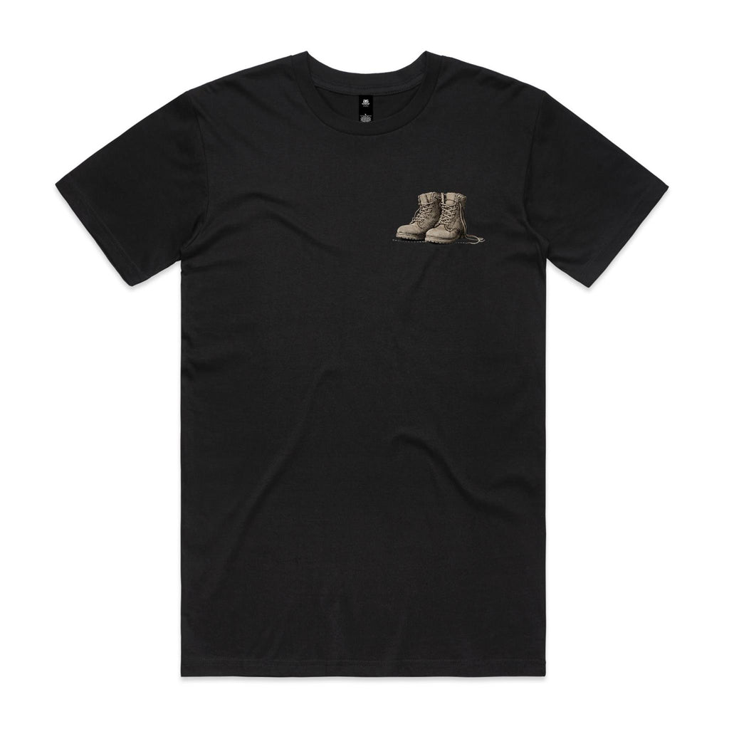 Front of the Black Voltare Boots on the Ground tee with earthy combat-style boots on the left chest