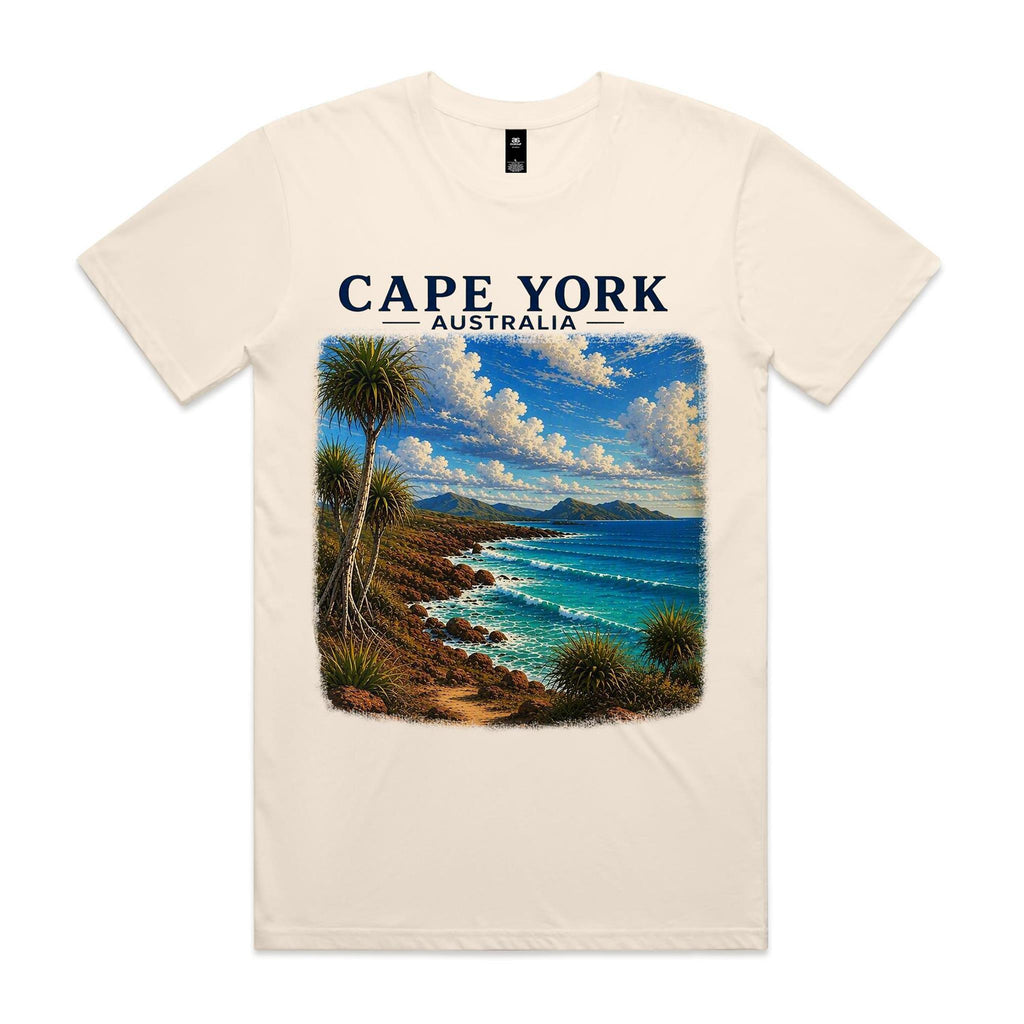 Ecru Voltare Cape York tee featuring pandanus trees, a rocky coastline and turquoise waves beneath Cape York Australia lettering