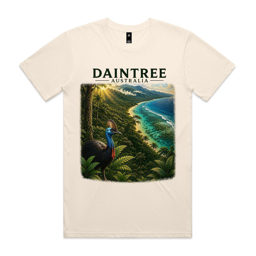Ecru Voltare Daintree tee featuring a cassowary among rainforest ferns beside a turquoise coastline beneath Daintree Australia lettering