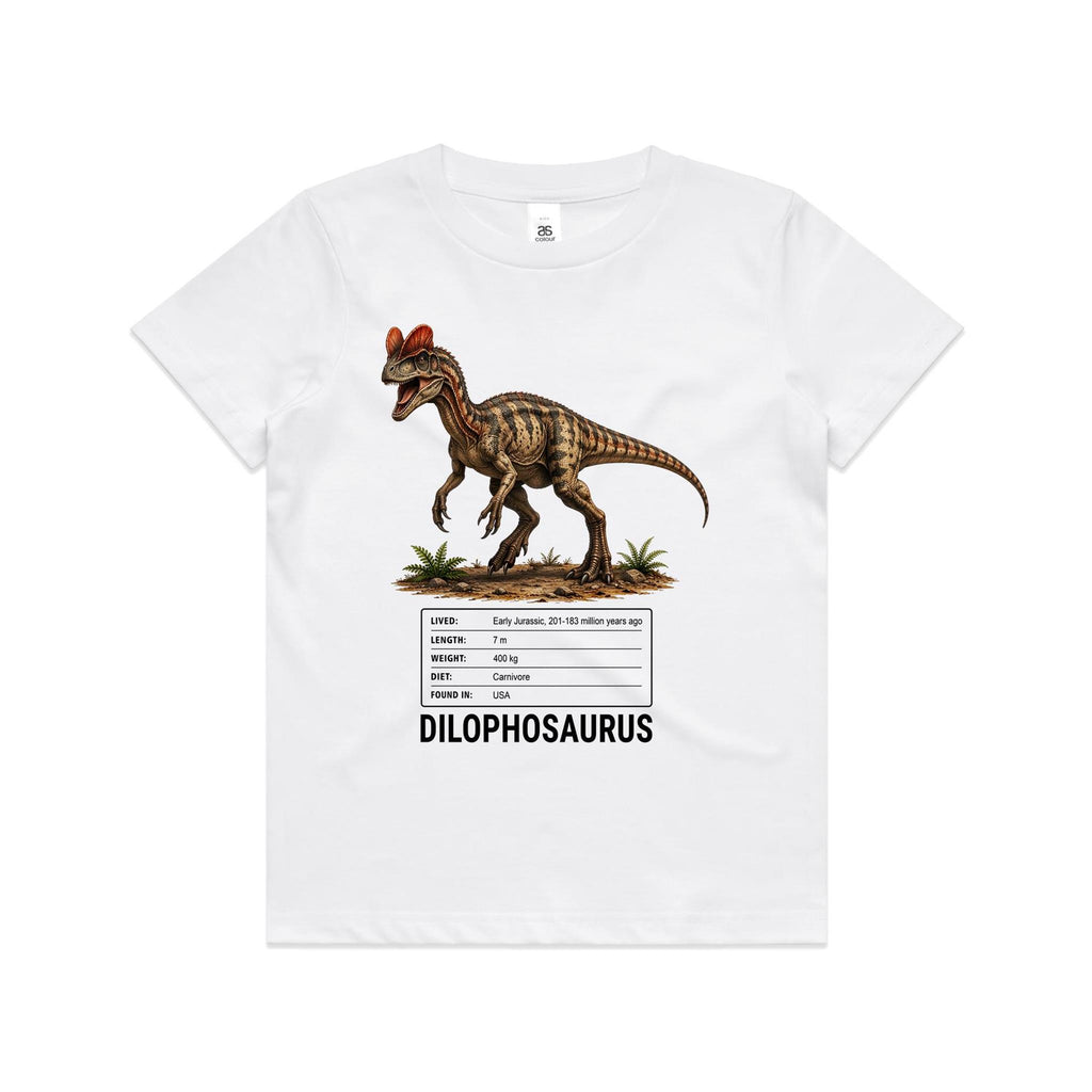White Voltare kids tee with brown-and-gold Dilophosaurus artwork, twin orange-red crests, a dinosaur facts panel and black Dilophosaurus lettering on the front.