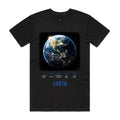 Front of Voltare Earth black tee with blue oceans, swirling clouds, sunlit continents, night-side city lights, planet-facts panel and deep-blue lettering