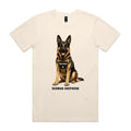 Ecru Voltare adult tee featuring a black-and-tan German Shepherd wearing a tan harness with a Watchdog badge, paw-print detail and black German Shepherd lettering.