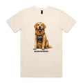 Ecru Voltare adult tee featuring a Golden Retriever wearing a tan harness with a Welcome Committee badge, paw-print detail and black Golden Retriever lettering.