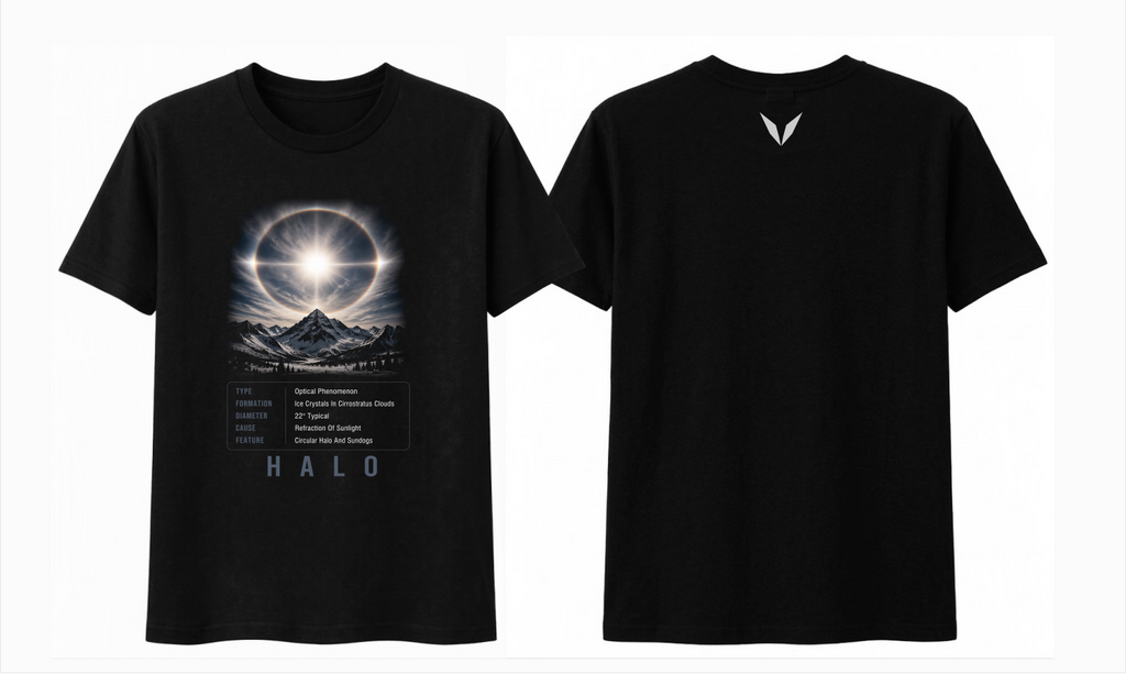Front and back preview of Voltare Halo black tee with solar halo and snowy mountain artwork, facts panel and light-grey Voltare V logo