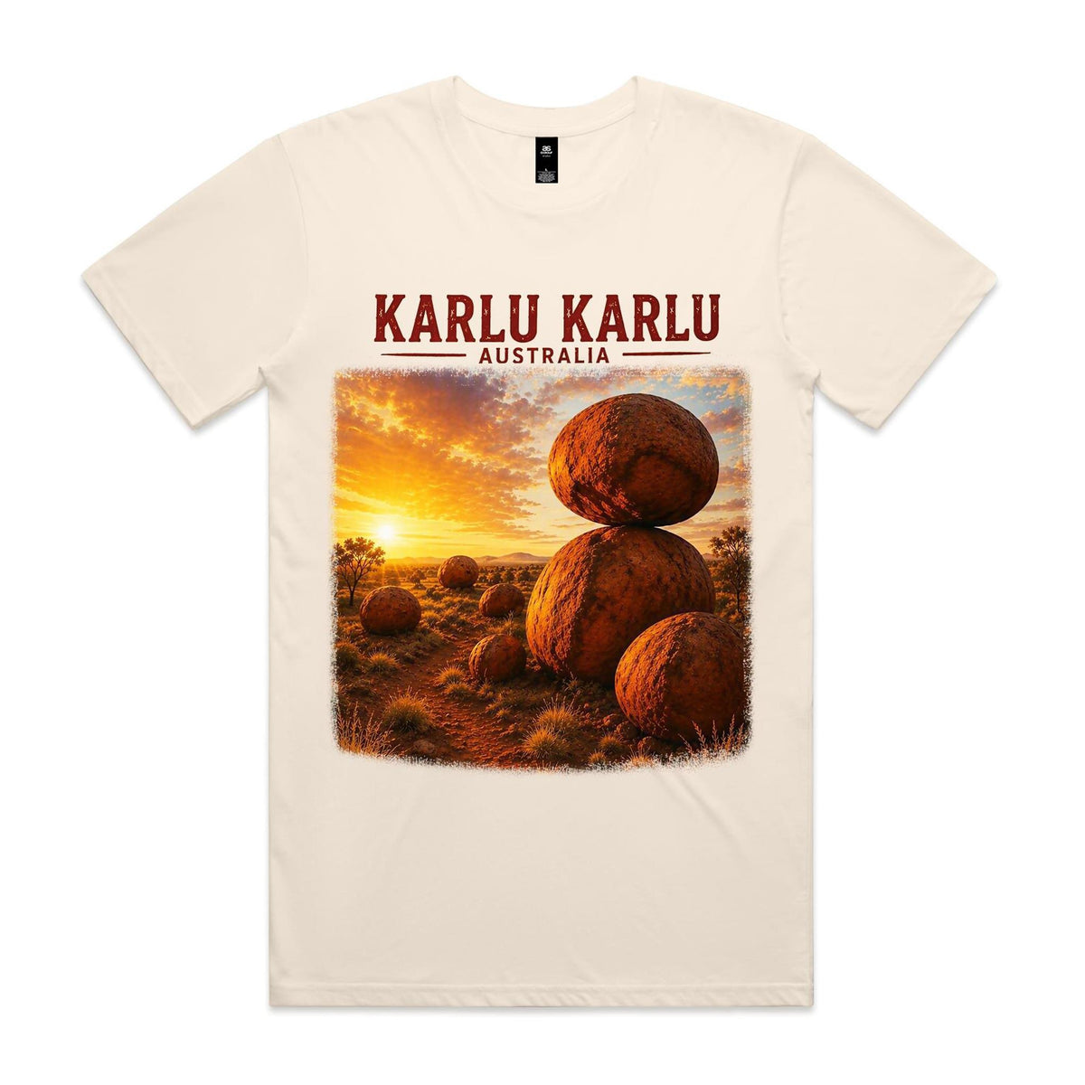 Ecru Voltare Karlu Karlu tee featuring rounded red boulders beneath a golden sunset with Karlu Karlu Australia lettering