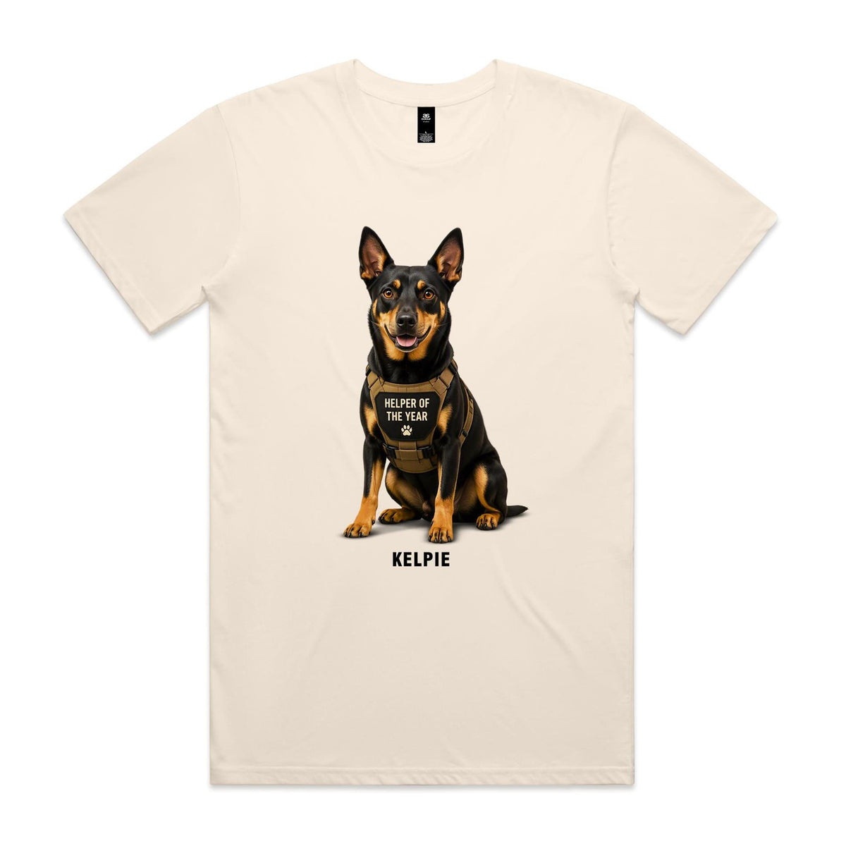 Ecru Voltare adult tee featuring a black-and-tan Kelpie wearing a tan harness with a Helper of the Year badge, paw-print detail and black Kelpie lettering.