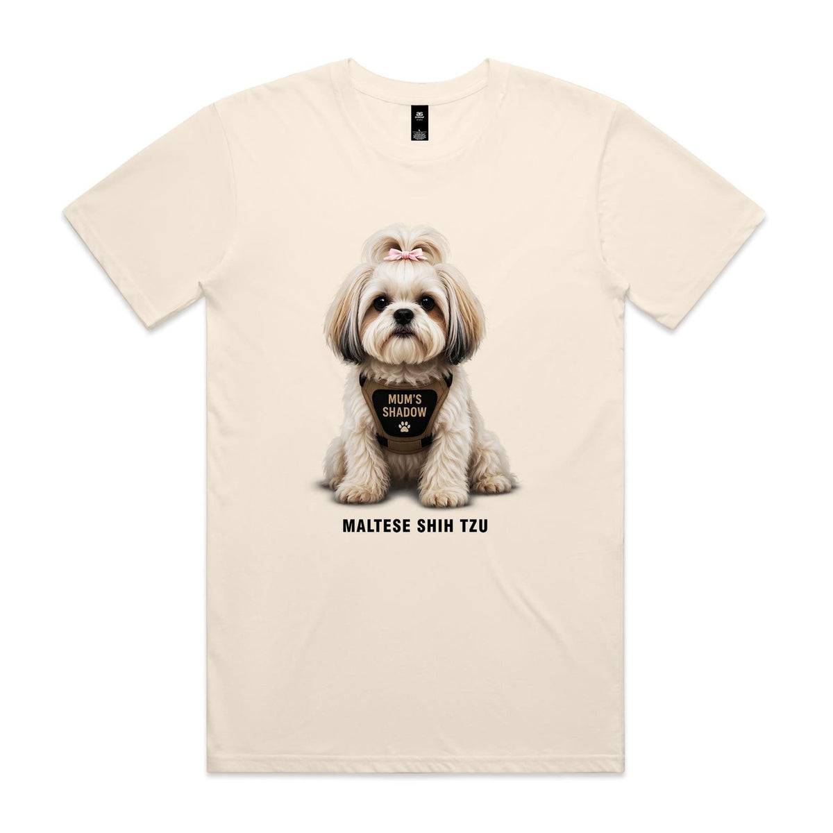 Ecru Voltare Maltese Shih Tzu tee featuring a cream-and-tan dog with a pink bow and Mum’s Shadow wording on its harness