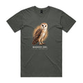 Front of the charcoal Voltare Masked Owl Sky Hunters T-shirt with an illustrated owl featuring a pale heart-shaped face and patterned brown wings against a warm amber backdrop.