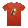 Front of the autumn orange Voltare Peregrine Falcon Sky Hunters T-shirt with an illustrated bird featuring slate-grey wings, dark facial markings and golden-yellow feet against an amber backdrop.