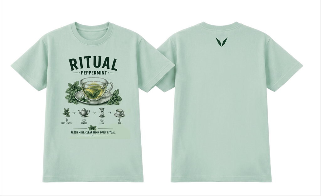 Front and back views of the seafoam Voltare Ritual Peppermint T-shirt, with engraved peppermint tea artwork and a small dark Voltare V logo on the upper back.