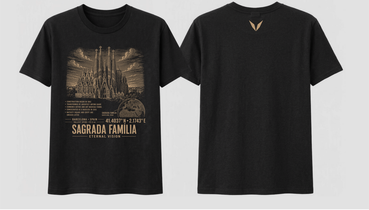 Front and back of the Black Voltare Sagrada Família Eternal Vision tee, showing basilica artwork above facts, a Barcelona map, coordinates and landmark lettering, with a small muted gold Voltare V high on the back


