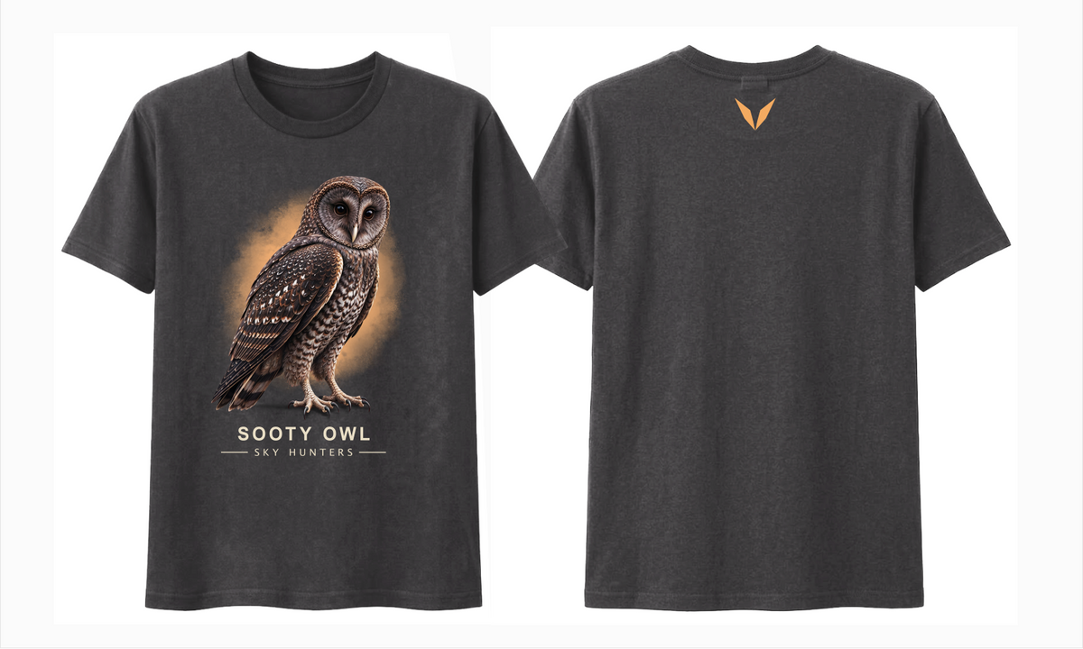 Front and back views of the charcoal Voltare Sooty Owl Sky Hunters T-shirt, with detailed owl artwork against an amber backdrop and a small amber Voltare V logo on the upper back.