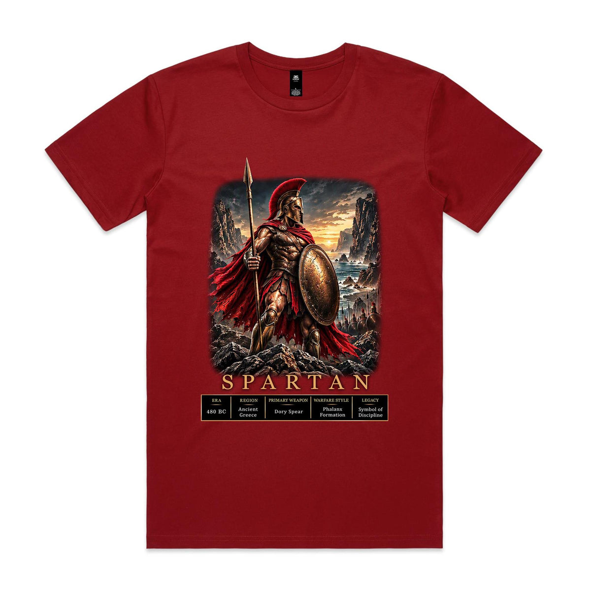 Cardinal Voltare Spartan tee featuring a bronze-armoured warrior with a spear and round shield, rocky coastal scenery and historical fact panels