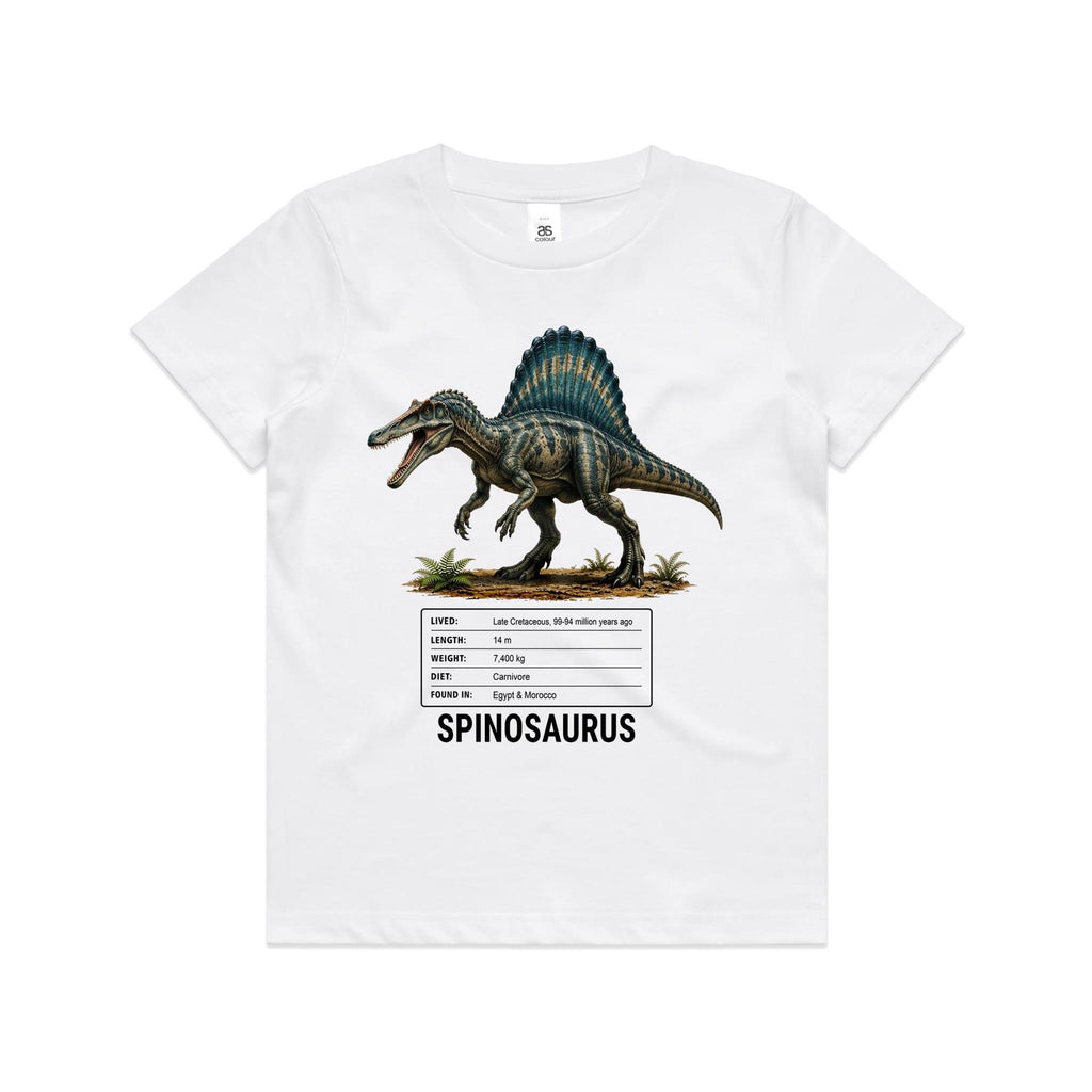 White Voltare kids tee with grey-green Spinosaurus artwork, a tall teal sail, dinosaur facts panel and black Spinosaurus lettering on the front.