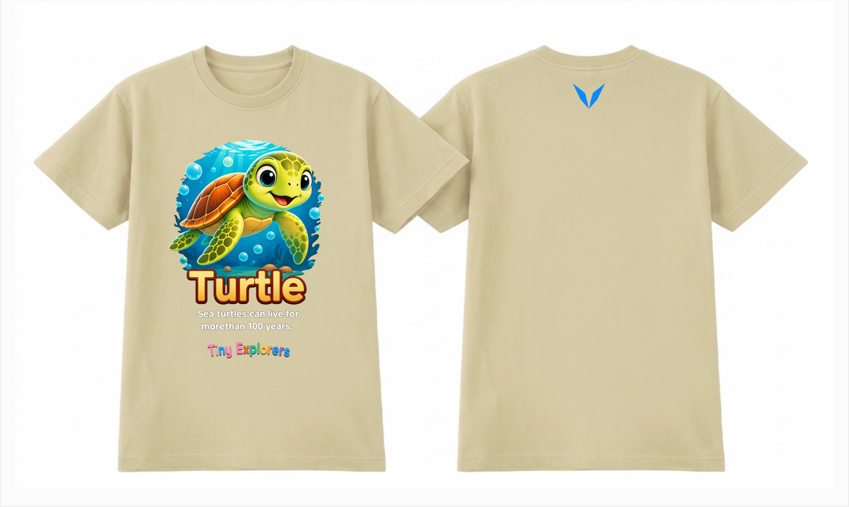 Front and back design preview of Voltare Turtle Tiny Explorers kids tee on a cream shirt with sea turtle artwork and bright-blue Voltare V logo