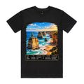 Front of Voltare Black Twelve Apostles T-shirt featuring golden limestone sea stacks, turquoise surf and a Victoria fact panel.