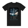 Front of Voltare Waterspout black tee with a white funnel beneath dark storm clouds over teal ocean water, weather-facts panel and teal lettering