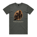 Front of the charcoal Voltare Wedge-tailed Eagle Sky Hunters T-shirt with an illustrated dark-brown eagle, golden-brown neck feathers and a hooked beak against a warm orange backdrop.