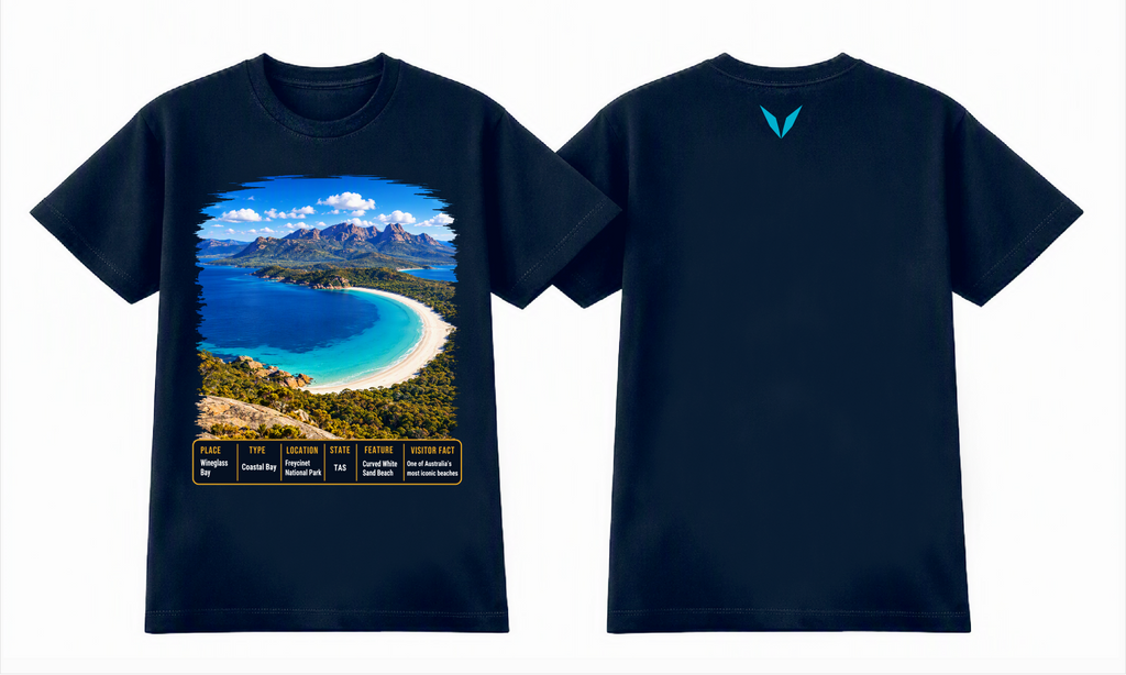 Combined front and back preview of Voltare Midnight Blue Wineglass Bay T-shirt with coastal artwork, a fact panel and turquoise Voltare V.